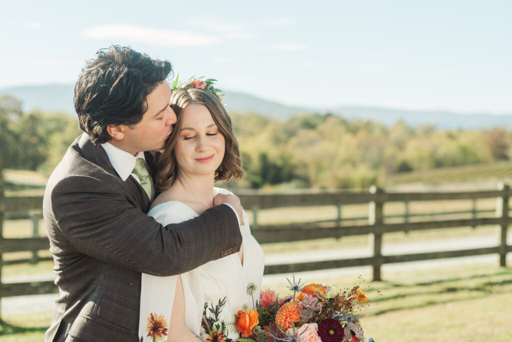 bride and groom portrait with mountain backdrop