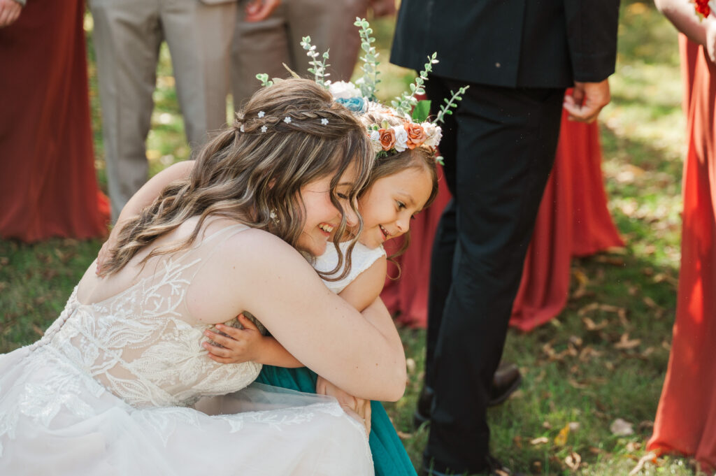 first look with flower girl