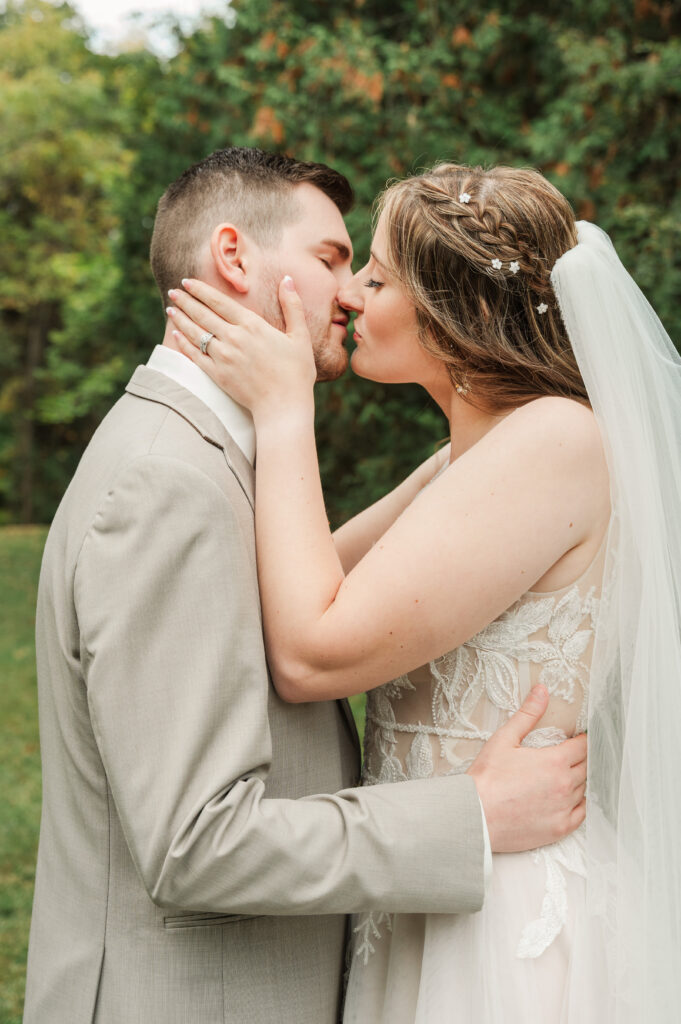 bride and groom kissing