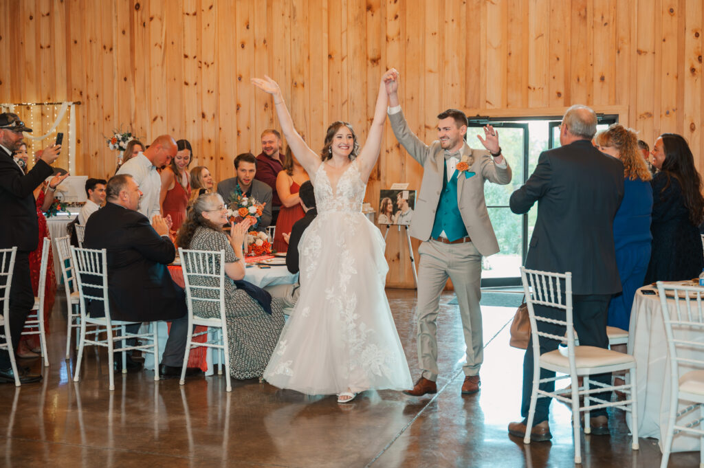 bride and groom entrance at wedding reception