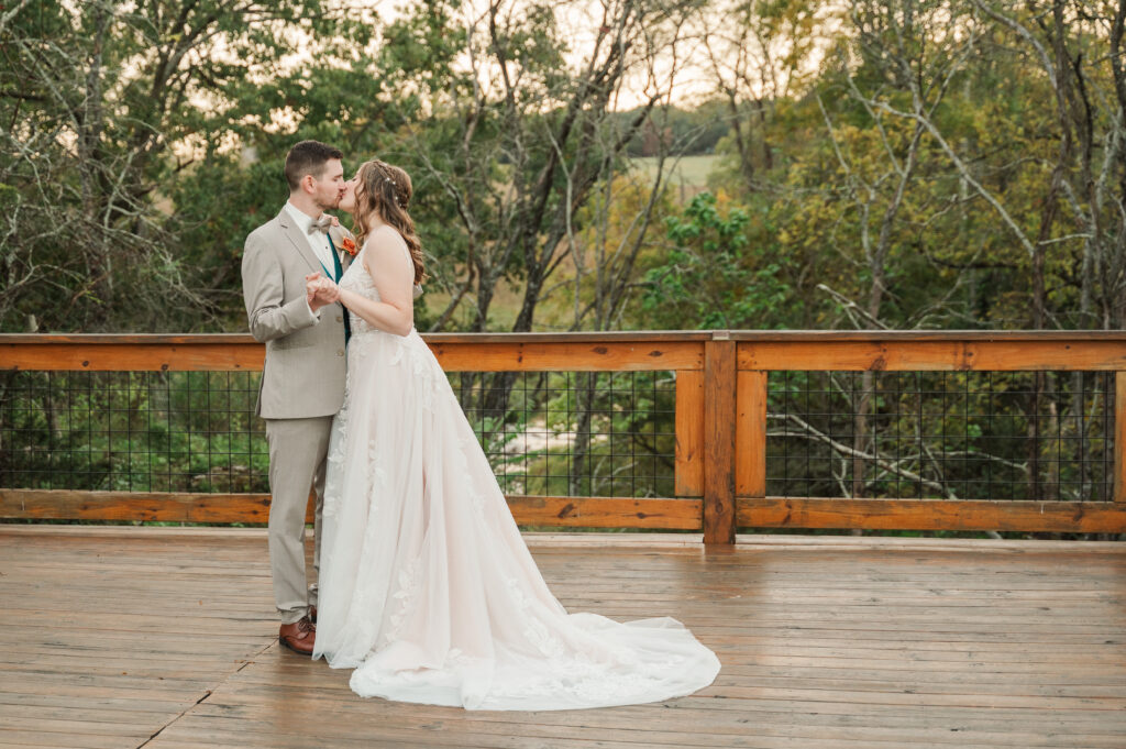 bride and groom dancing on deck at Valley Mills Farm