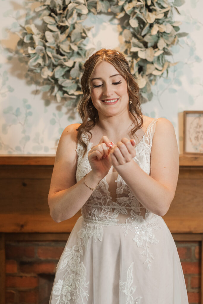 bride putting on perfume