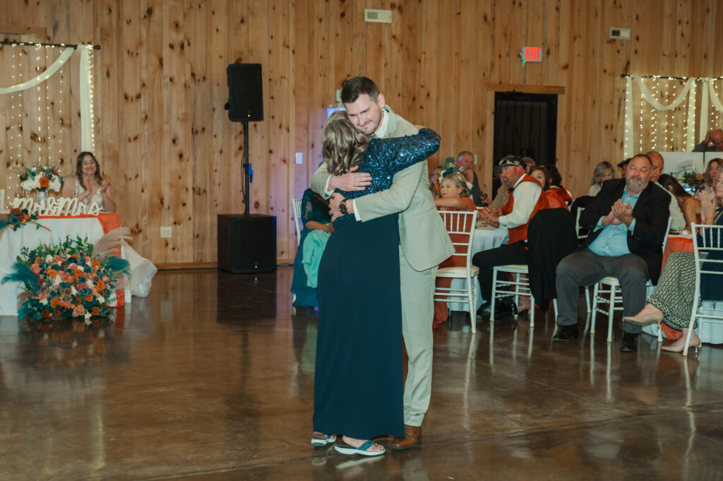 groom dancing with mom