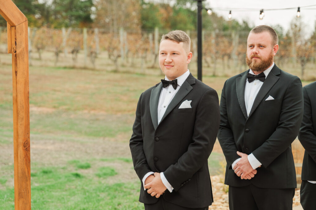 groom's reaction to bride coming down the aisle