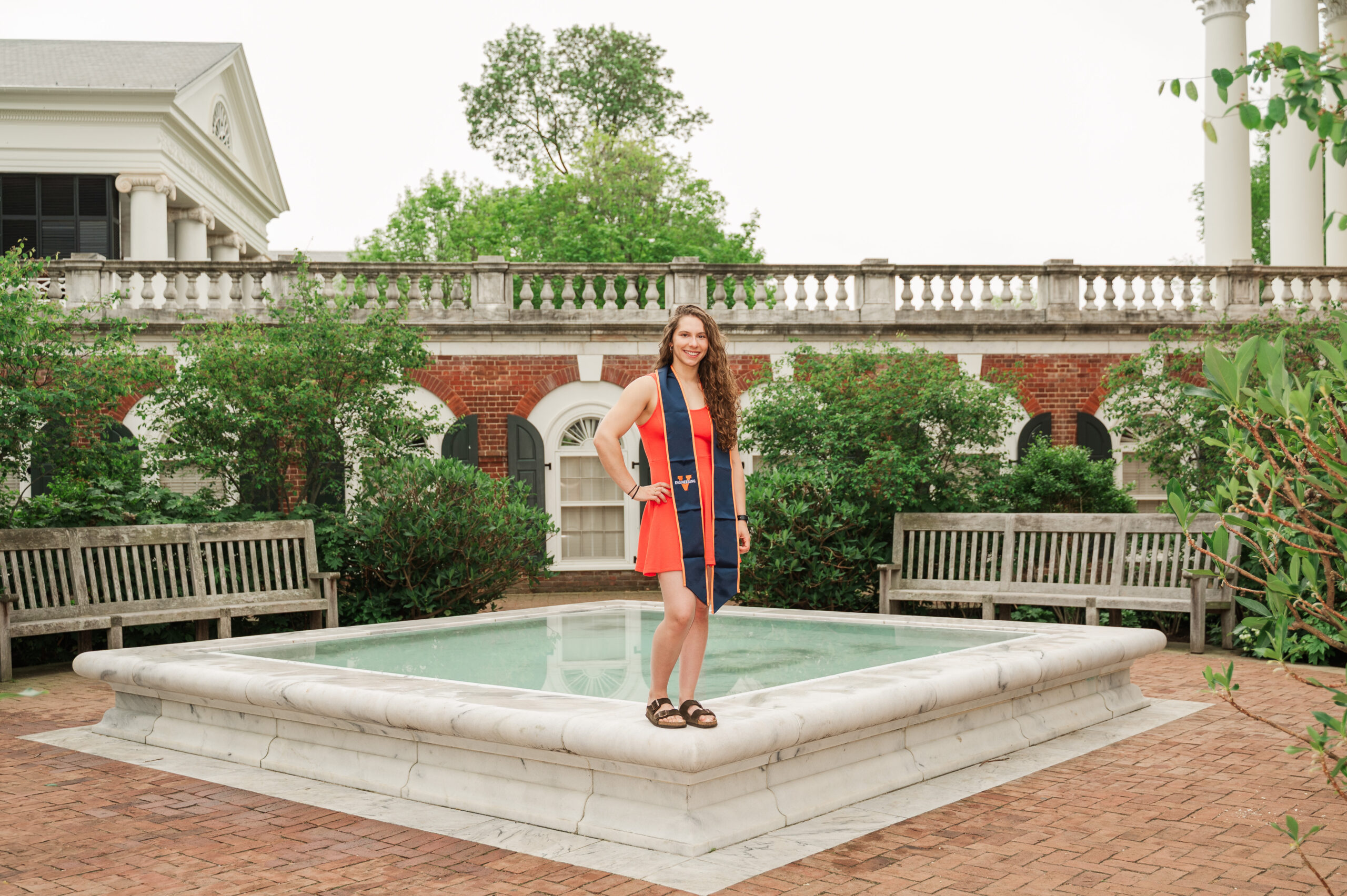 Emily standing on Fountain in East Courtyard at University of Virginia Rotunda