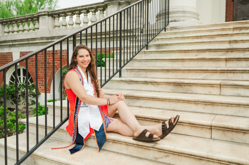 Emily sitting on steps at UVA Rotunda