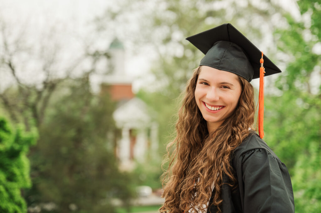 close up of Emily in graduation cap and gown