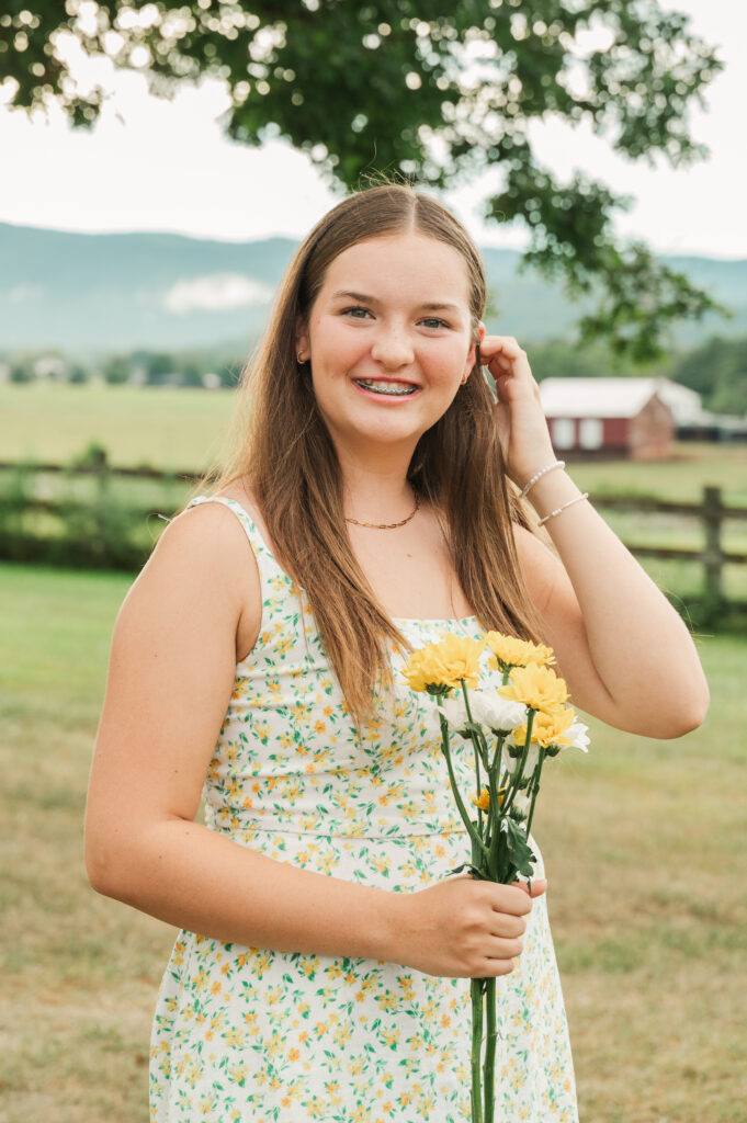 granddaughter with daisies