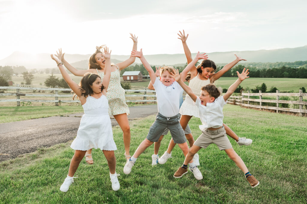 grandkids jumping for joy during extended family session