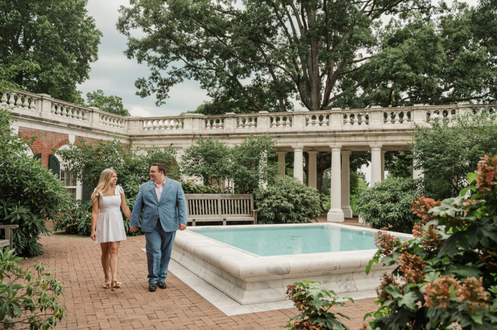 Micheala and Wade walking in the East Courtyard at the Rotunda