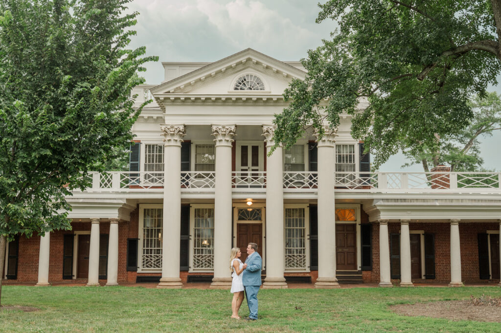 couple dancing on the Lawn of the Academic Village at UVA