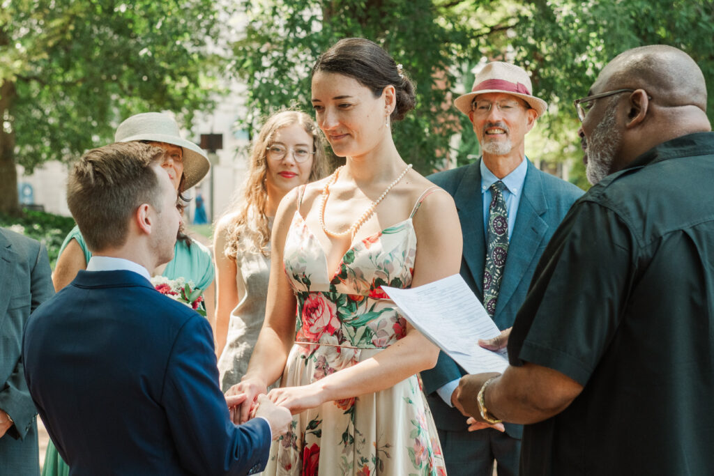 family-members-watching-intimate-elopement-ceremony-in-charlottesville