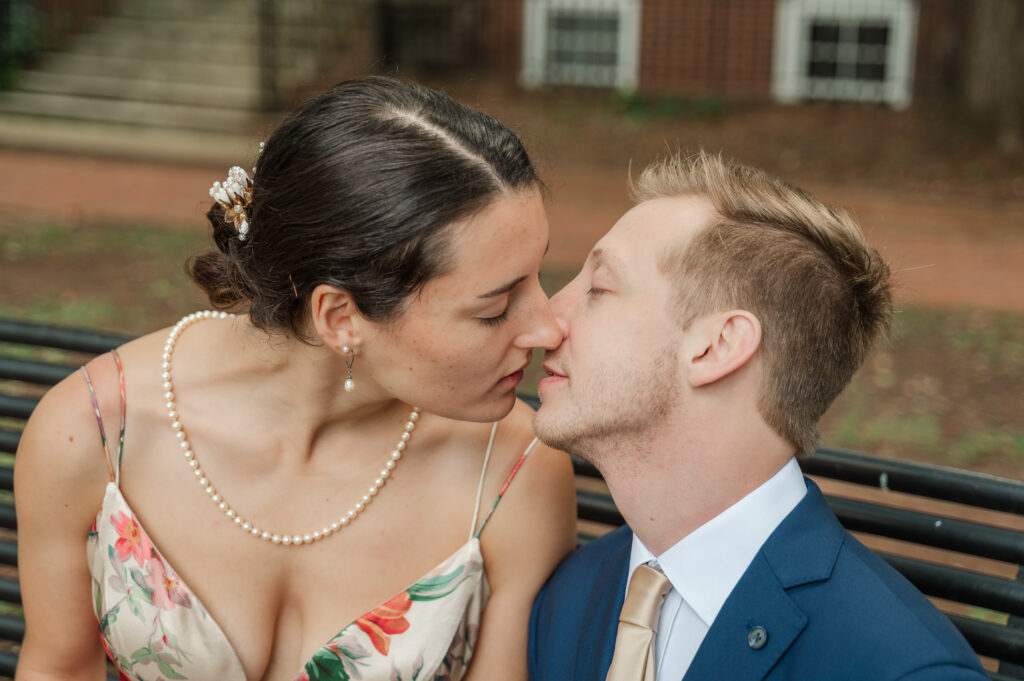 bride and groom kissing after wedding ceremony