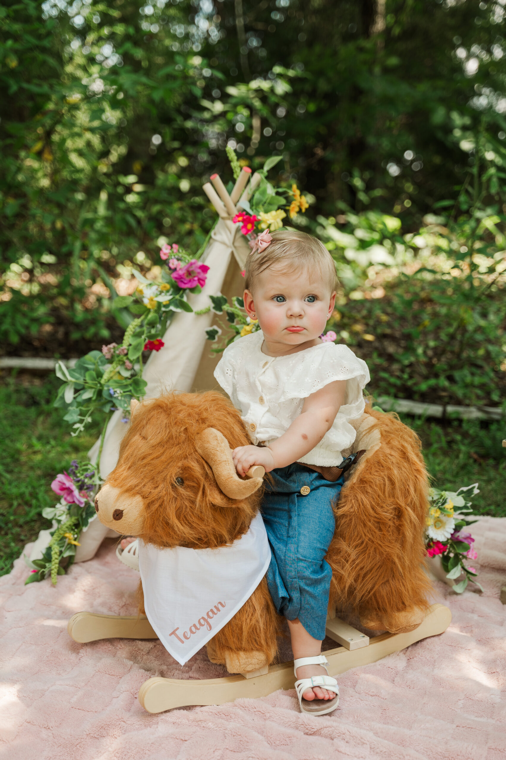 Tegan riding her rocking cow