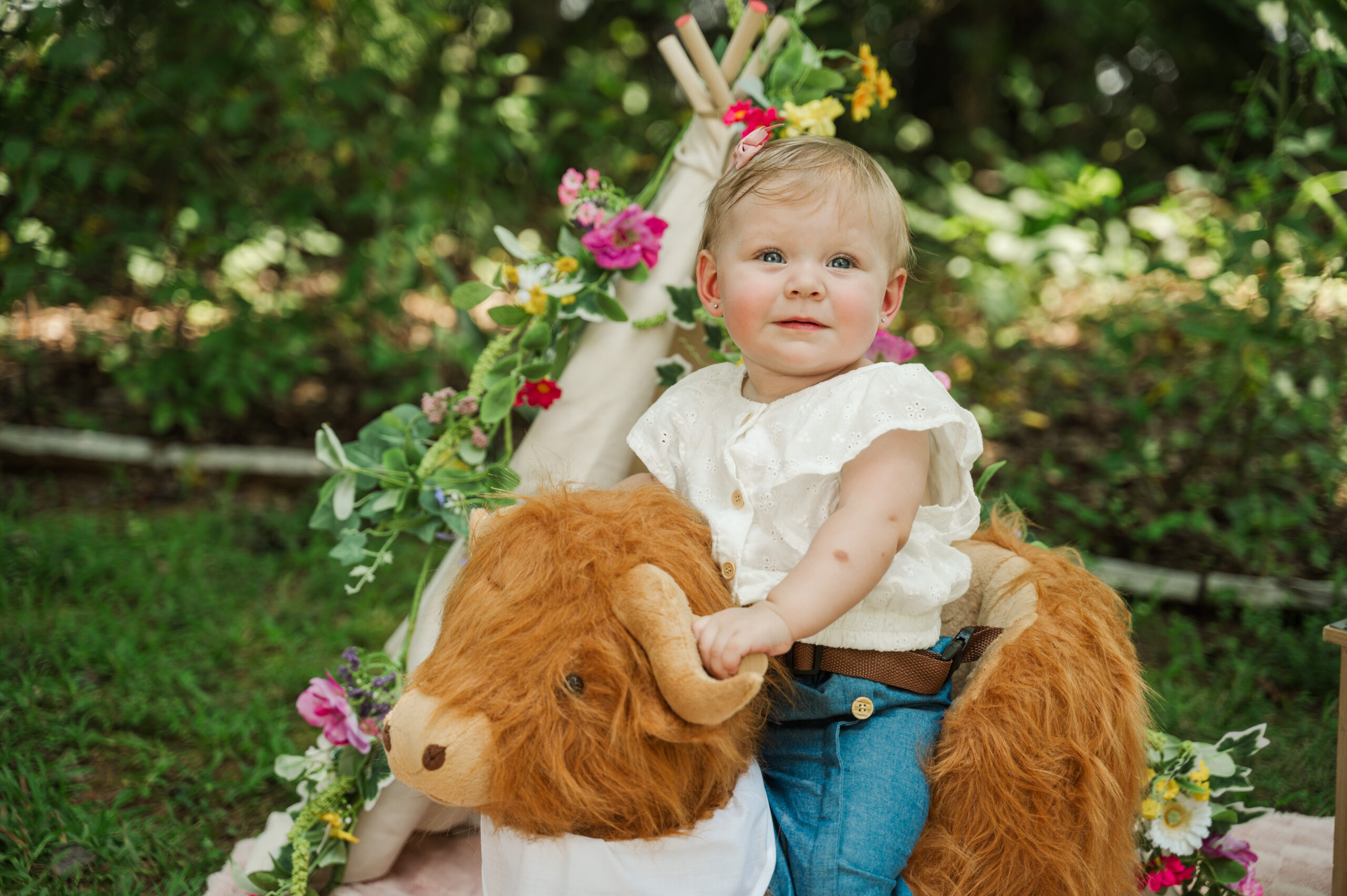 Teagan riding her rocking cow