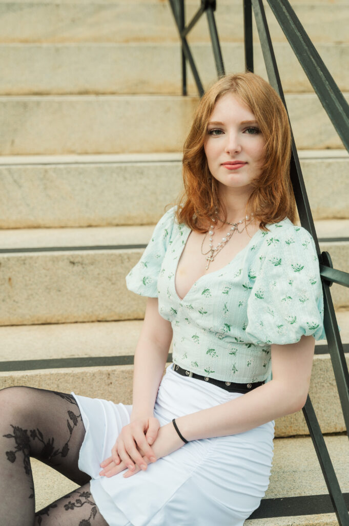 Raichyl sitting on the steps at The Miller School of Albemarle