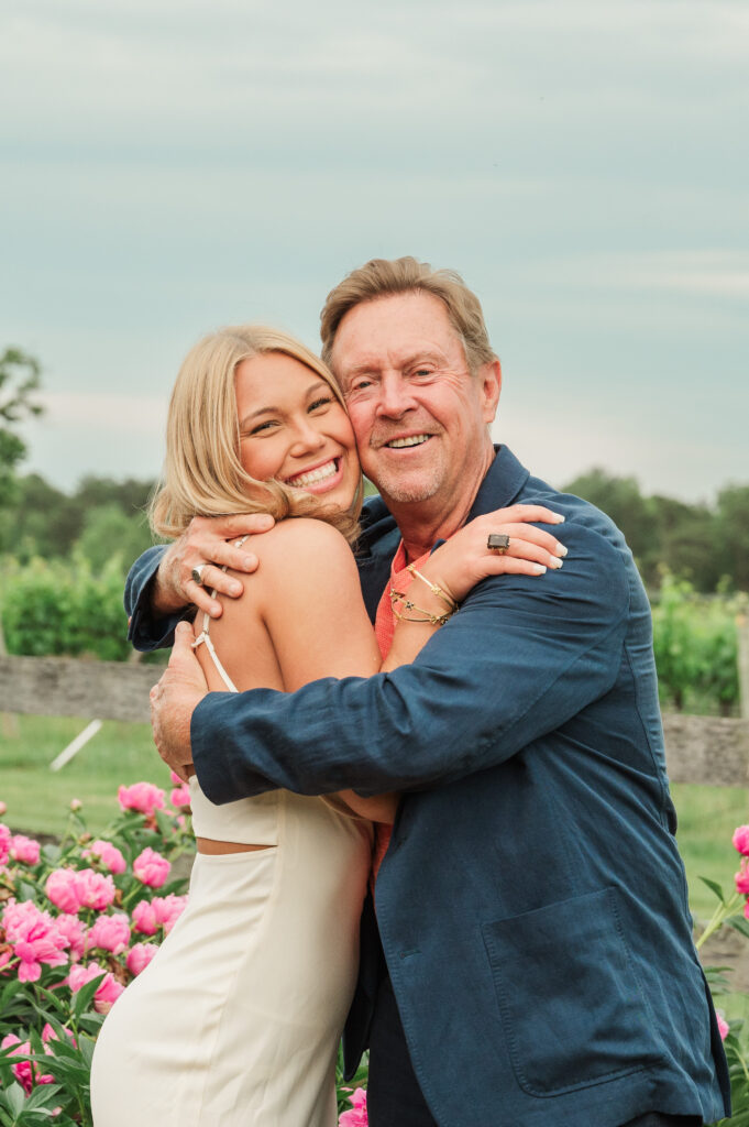 UVA grad hugging her dad
