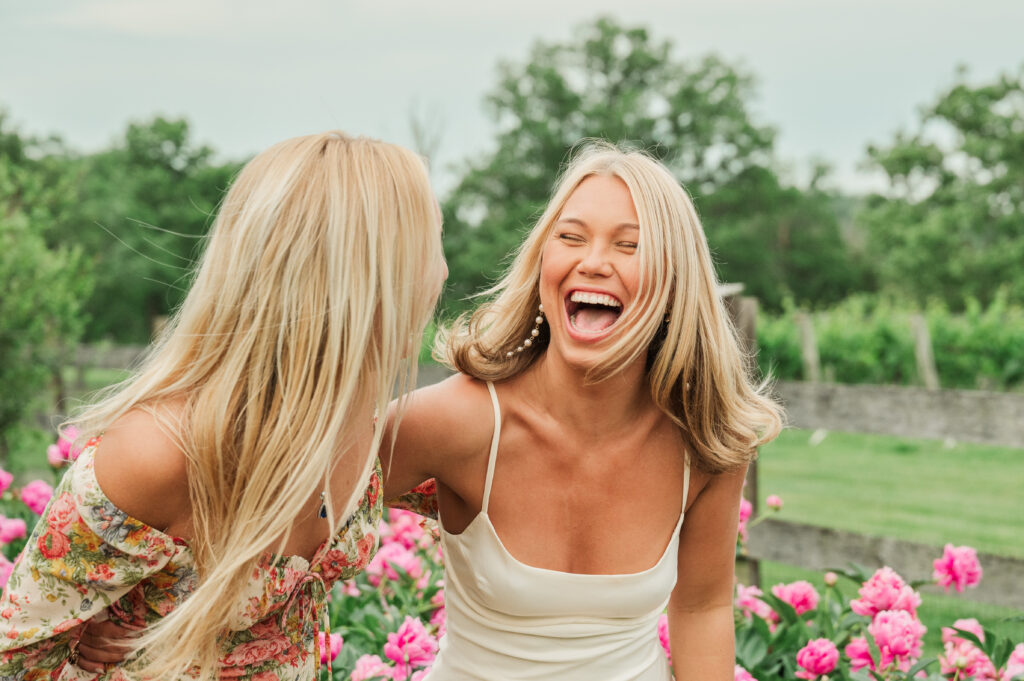 UVA graduate laughing with her sister at party