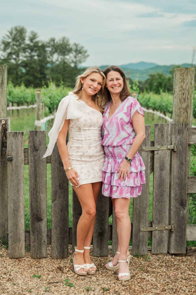 UVA graduate posing with family member during party