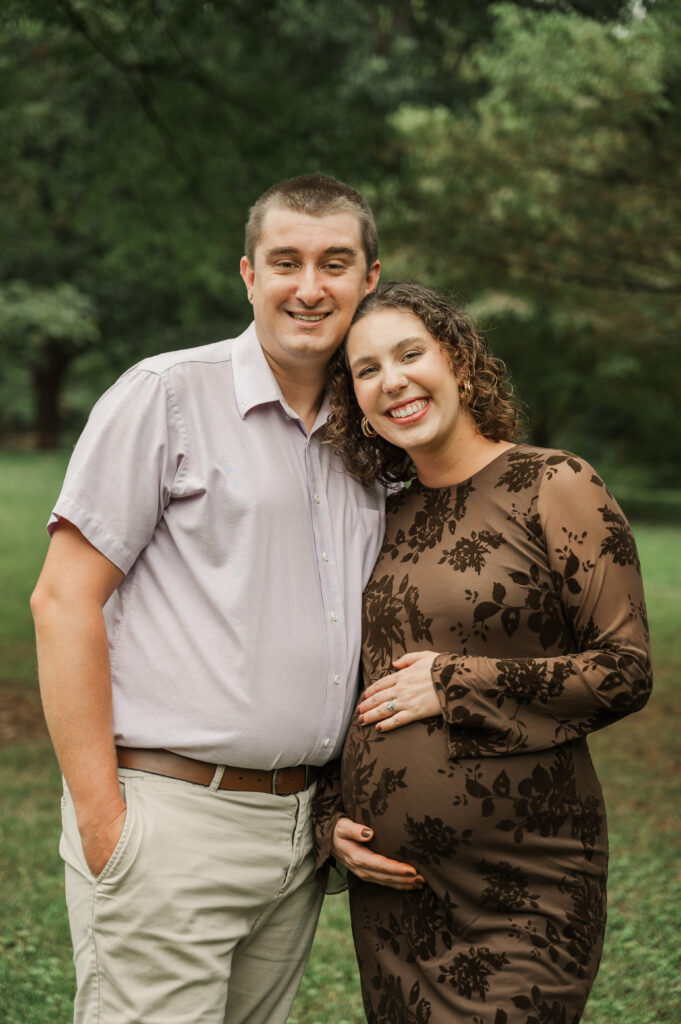 September maternity portrait on a cloudy day at Saunders-Monticello Trail with pregnant Emily and her husband Derek