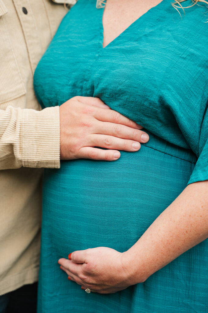 Close-up of maternity bump at Tanglewood Park.