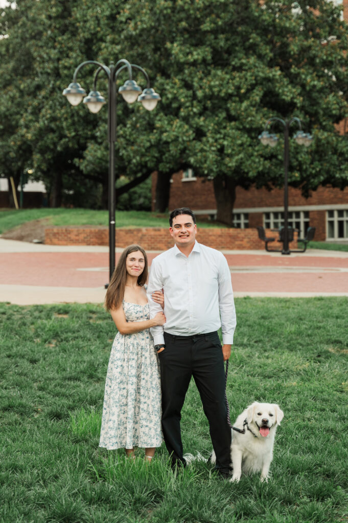 Duke standing beside Kara & Alex beside the Belmont Bridge