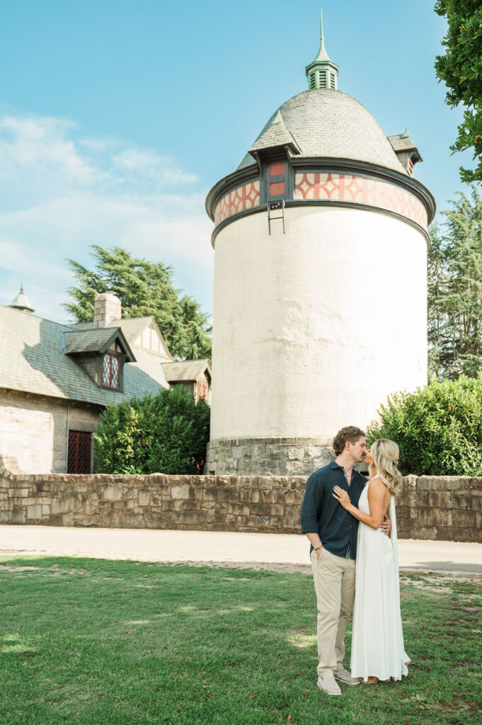 couple in front of stone water tower at Maymont