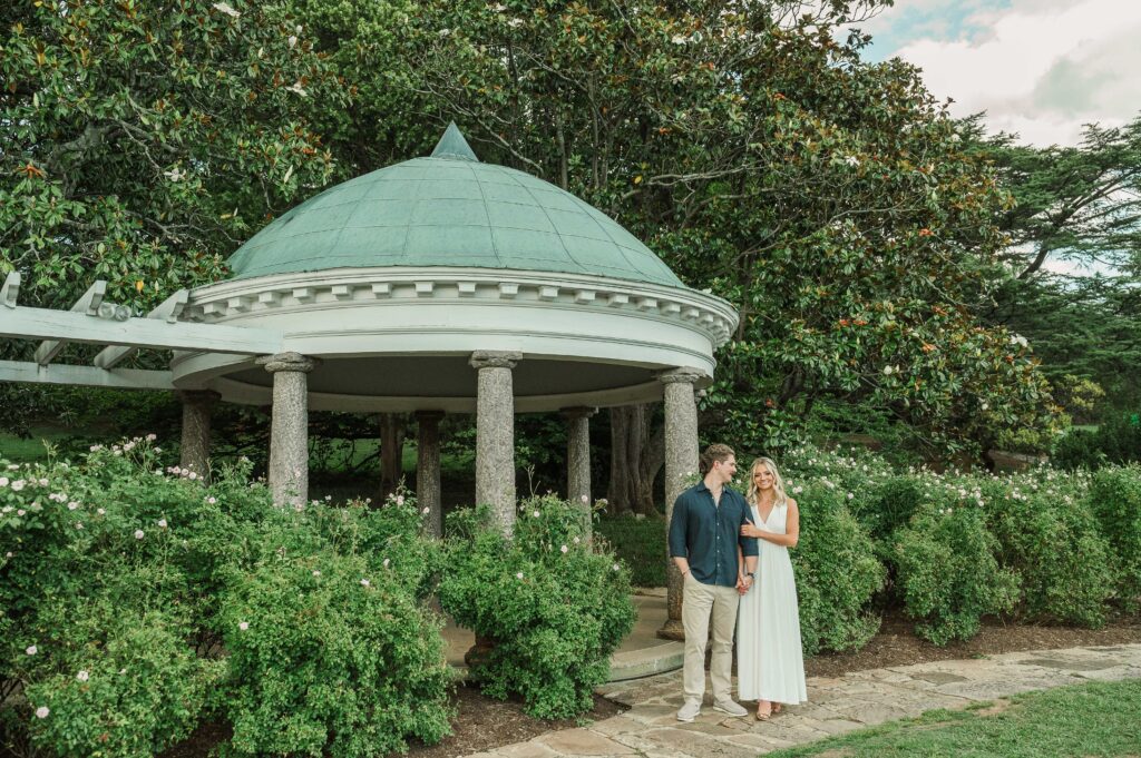 couple standing in front of pavilion at Maymont