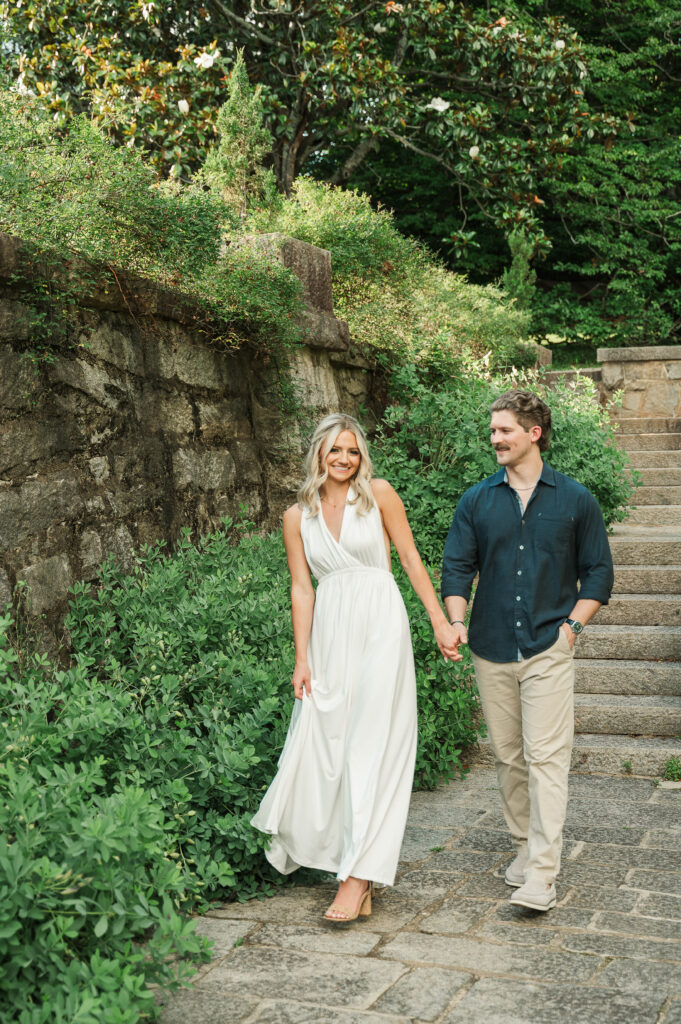 couple walking around Italian garden