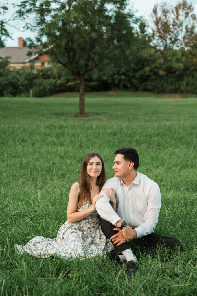 Alex gazing at Kara while sitting in park at Pantops