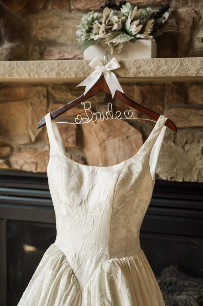 bodice of Jordan's ivory woven floral jacquard wedding gown