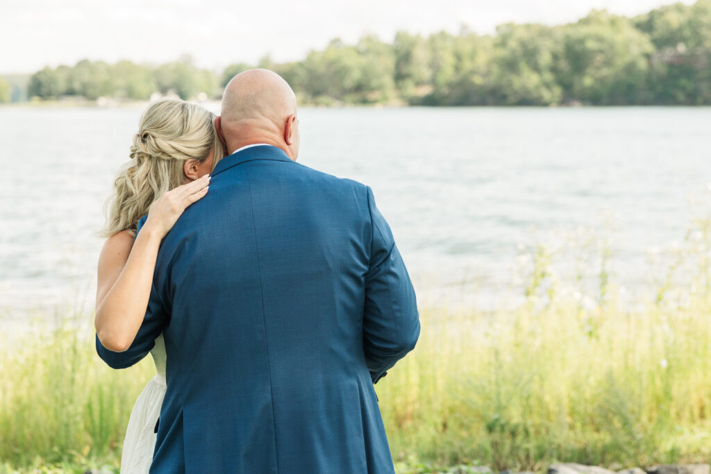 Jordan and her dad sharing a moment lakeside at Seay Point
