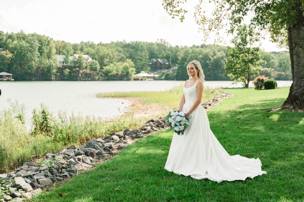 bridal portrait of Jordan standing on lakeside