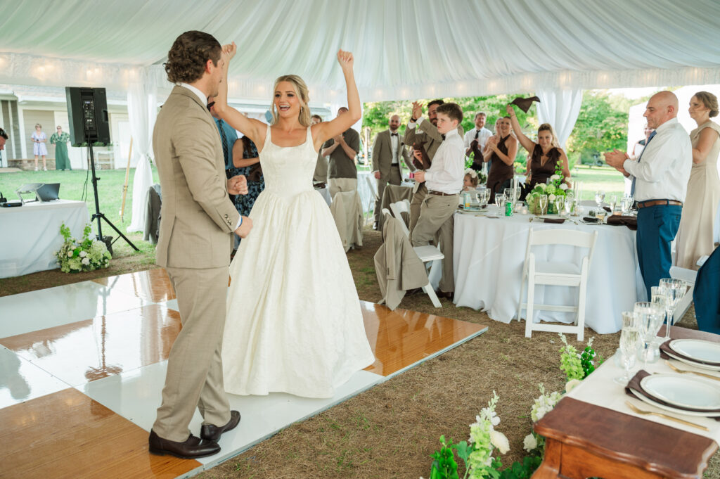 bride and groom celebrating at reception