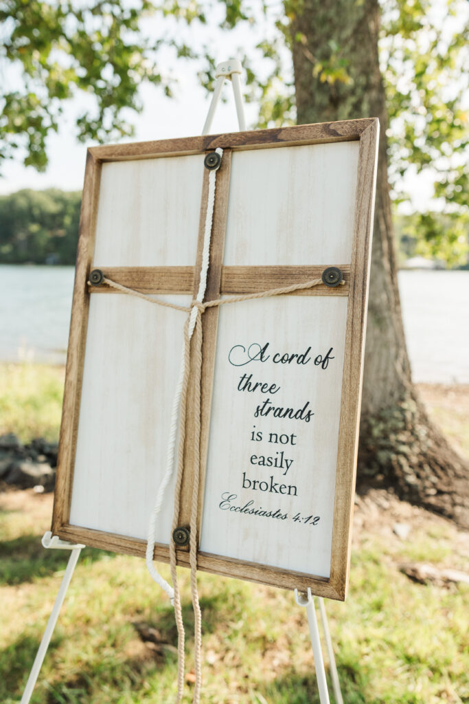 framed cross with three cords to braid by bride and groom