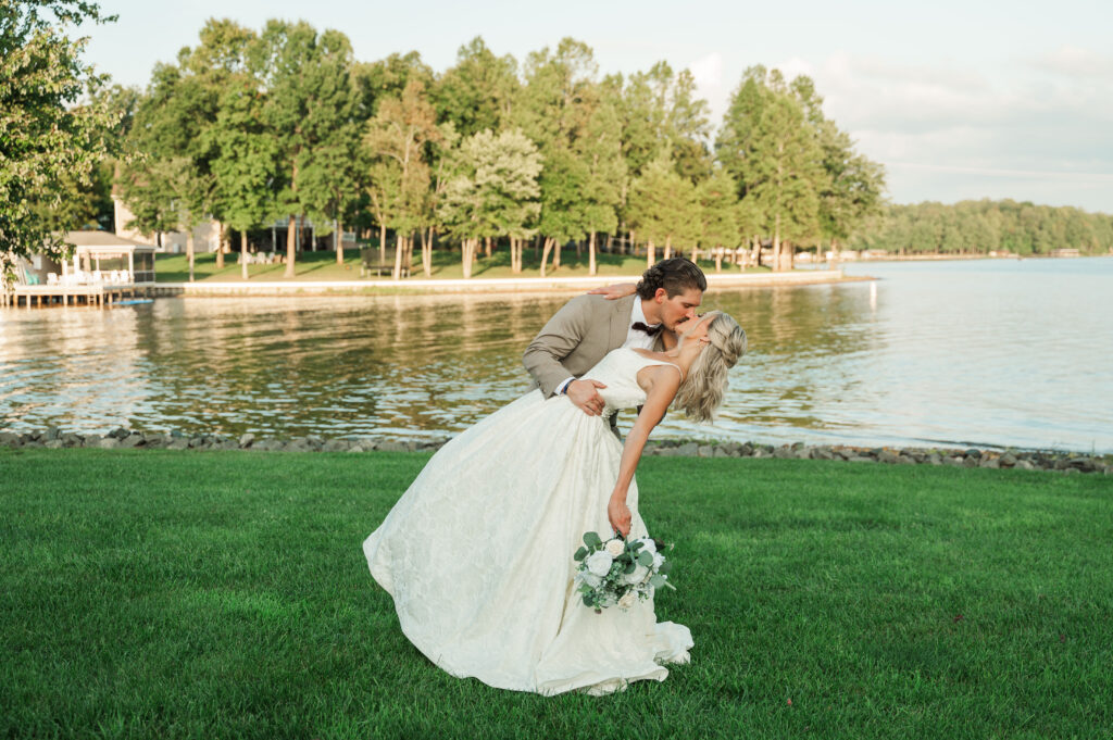 groom dipping bride