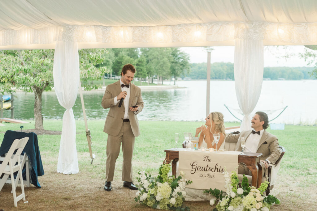 Best man toasting bride and groom