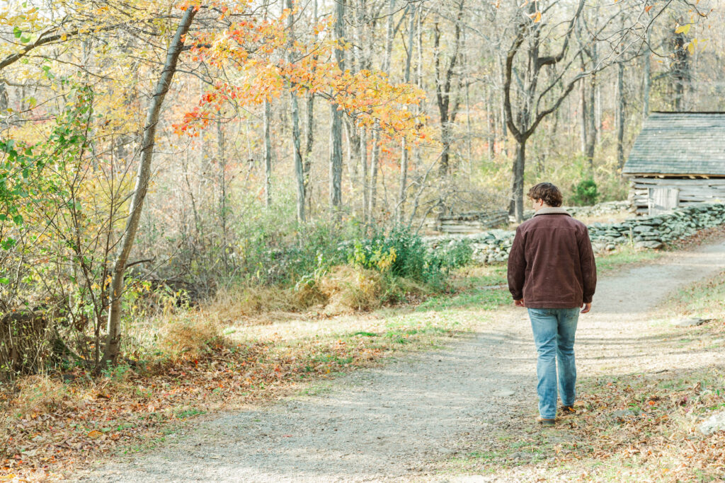 Senior walking on path in woods at Humpback Rocks