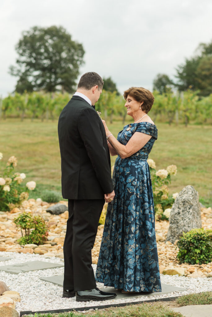 groom with mom before the ceremony